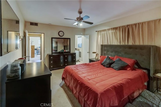 bedroom featuring ceiling fan and light colored carpet