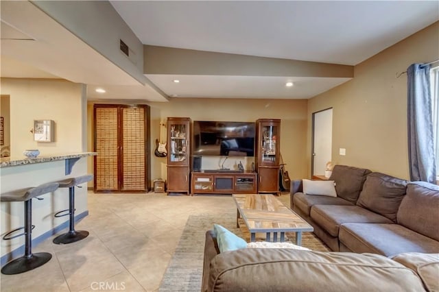 living room featuring light tile patterned floors