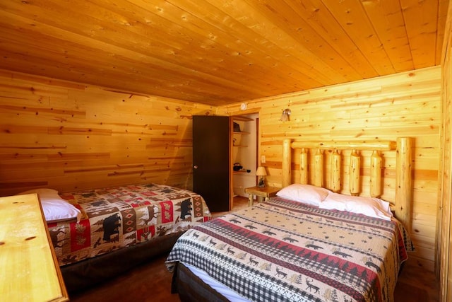 bedroom featuring wooden walls and wood ceiling