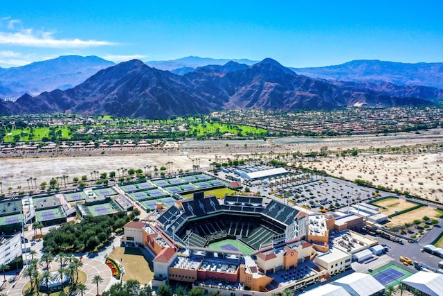 birds eye view of property featuring a mountain view