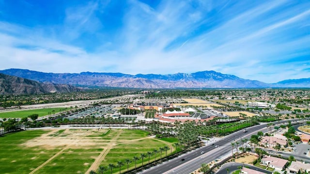 birds eye view of property with a mountain view