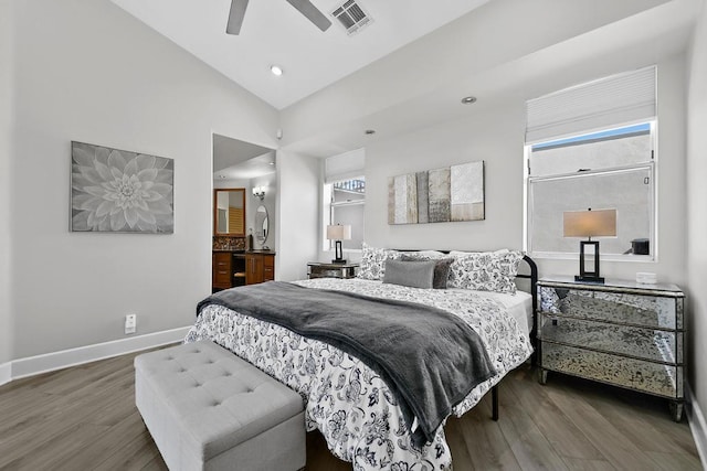 bedroom featuring ceiling fan, dark hardwood / wood-style flooring, and high vaulted ceiling