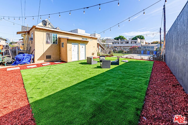 view of yard with french doors