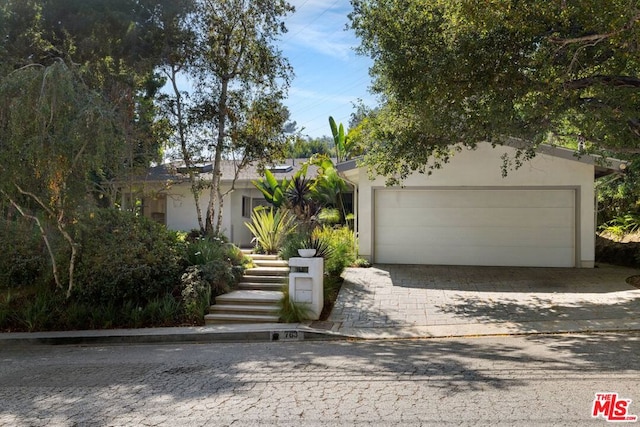 view of front of property featuring a garage