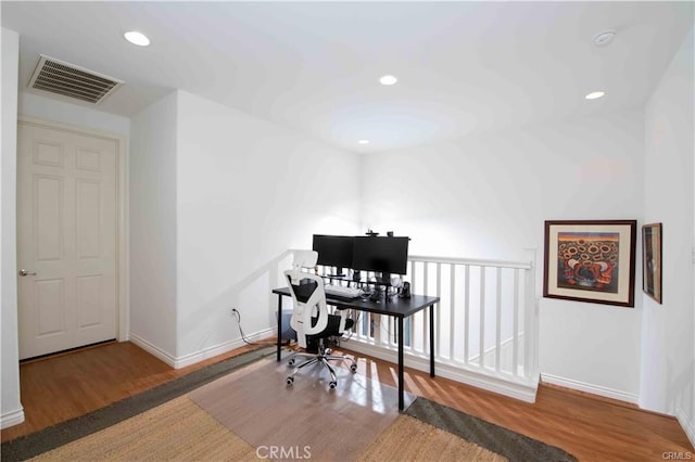 office area with hardwood / wood-style floors