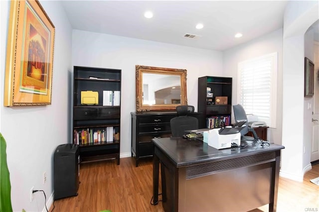 home office featuring hardwood / wood-style flooring