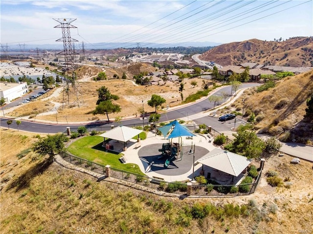 birds eye view of property with a mountain view