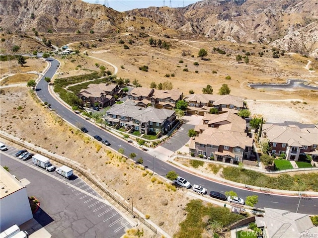 drone / aerial view featuring a mountain view