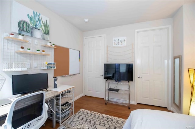 bedroom featuring hardwood / wood-style flooring