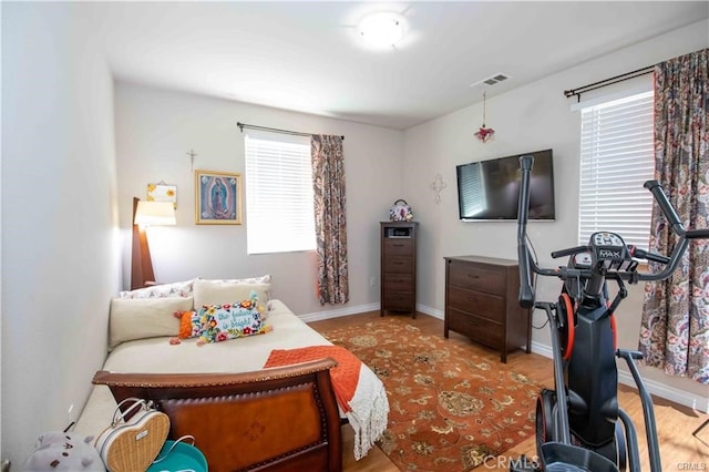 bedroom featuring hardwood / wood-style flooring