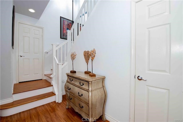 stairway with wood-type flooring