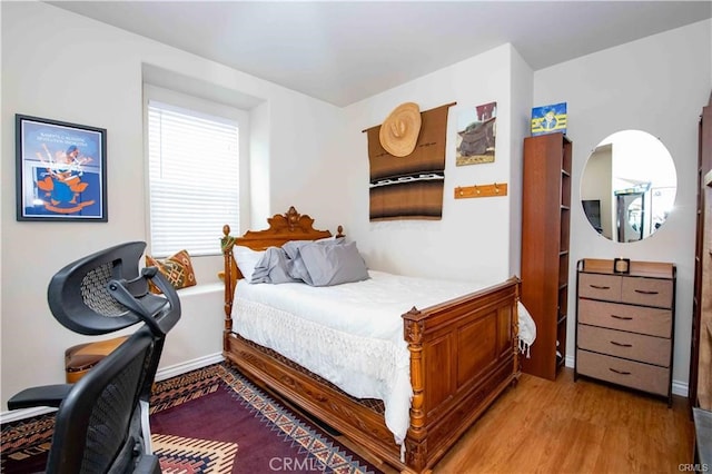 bedroom featuring light hardwood / wood-style floors