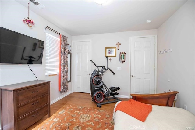 bedroom featuring light wood-type flooring