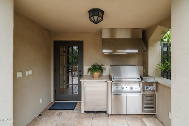 view of patio / terrace with area for grilling and exterior kitchen