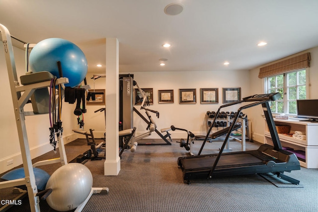 exercise area featuring carpet