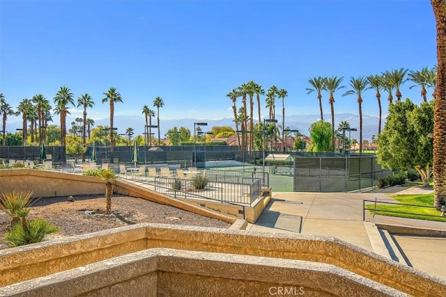 exterior space featuring tennis court