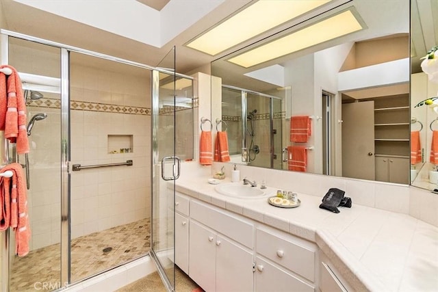 128 Desert Falls Dr E, Palm Desert, CA 92211 - full bath featuring a stall shower and vanity