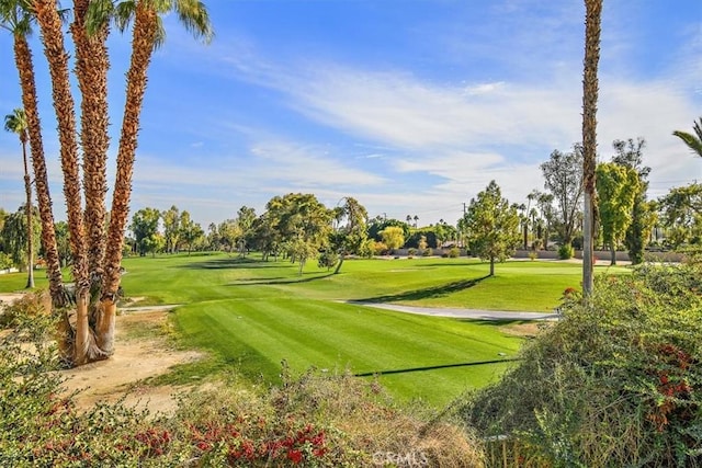 128 Desert Falls Dr E, Palm Desert, CA 92211 - surrounding community with a yard and view of golf course