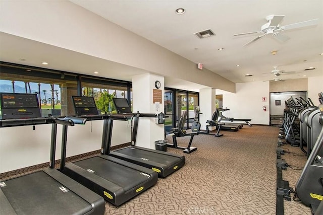 gym with carpet and ceiling fan