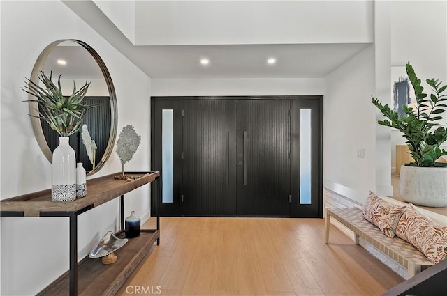 foyer with light wood-type flooring