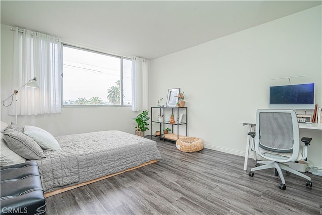 bedroom featuring hardwood / wood-style flooring