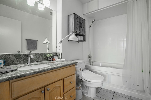 full bathroom with tile patterned flooring, shower / bathtub combination with curtain, vanity, and toilet