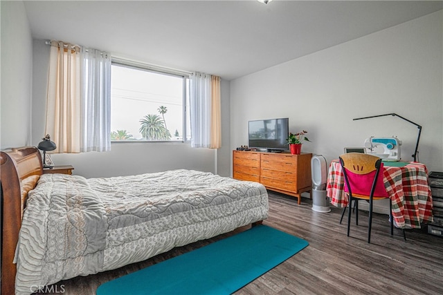 bedroom featuring dark hardwood / wood-style floors