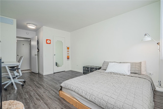 bedroom featuring dark hardwood / wood-style floors