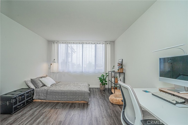 bedroom featuring dark hardwood / wood-style floors