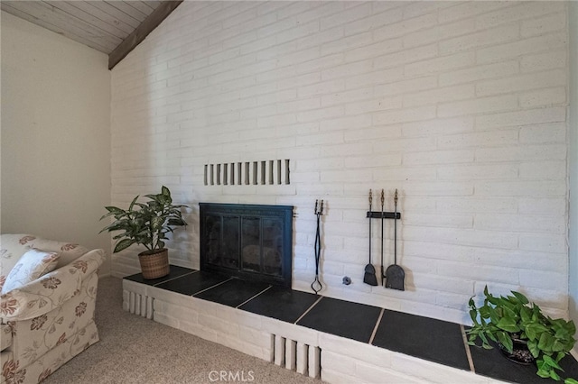 room details with carpet and a tiled fireplace