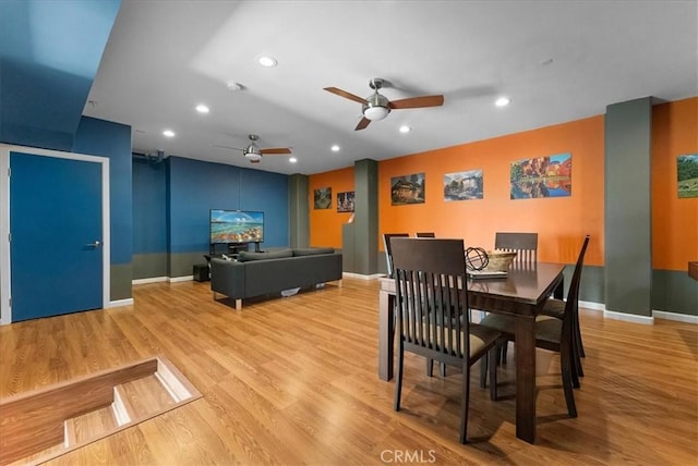 dining area featuring ceiling fan and light hardwood / wood-style floors