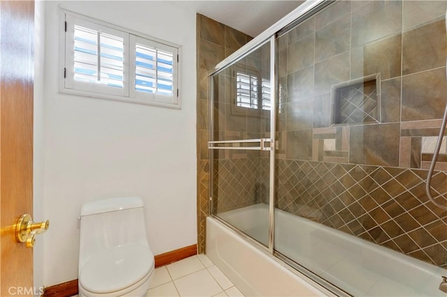 bathroom with enclosed tub / shower combo, toilet, and tile patterned flooring