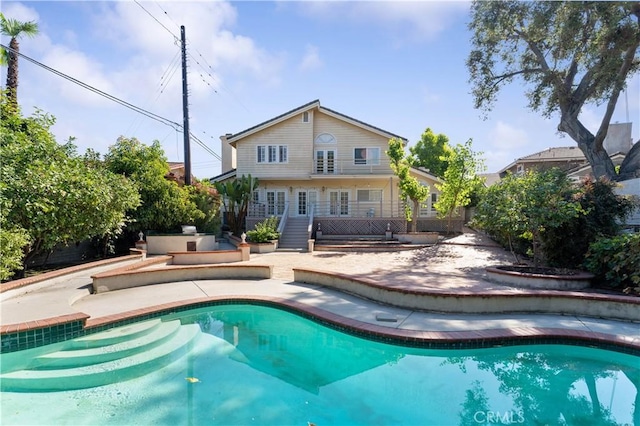 view of pool featuring a patio area