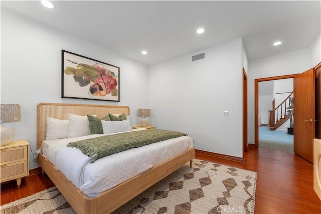 bedroom featuring hardwood / wood-style flooring