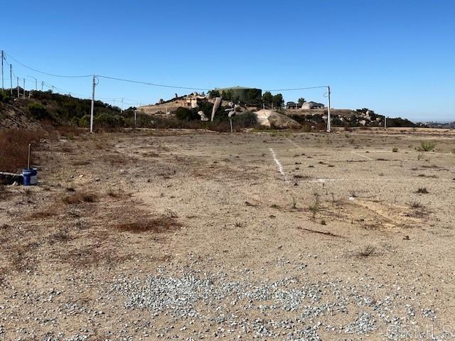 view of yard with a rural view