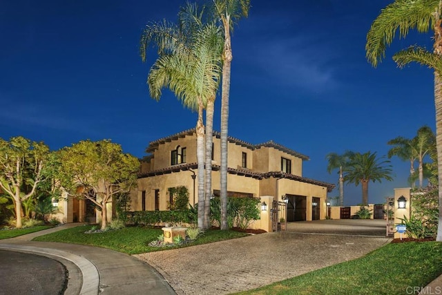 view of front of property featuring a garage