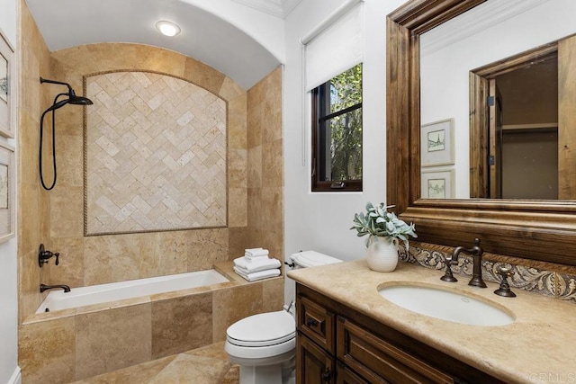 bathroom featuring vanity, crown molding, and toilet