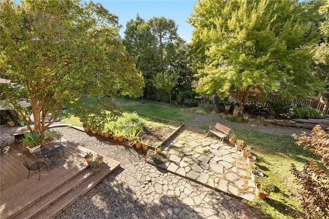 view of yard with a wooden deck