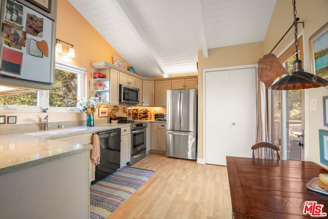 kitchen with appliances with stainless steel finishes, lofted ceiling with beams, light wood-type flooring, light brown cabinetry, and sink