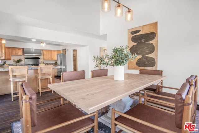 dining area featuring dark hardwood / wood-style flooring