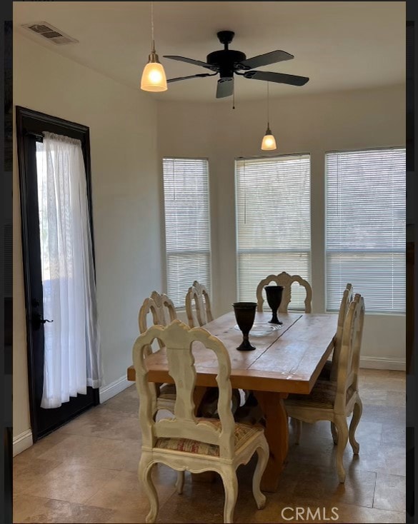 dining room with ceiling fan