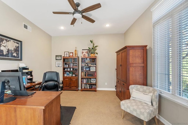 office with ceiling fan and light colored carpet