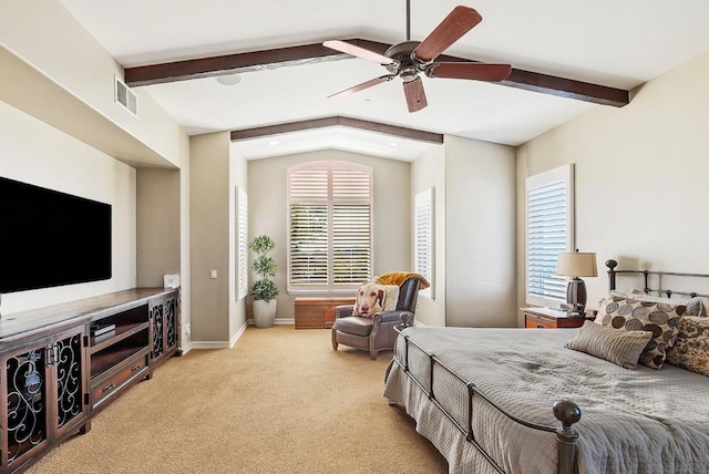 bedroom featuring ceiling fan, light carpet, and multiple windows