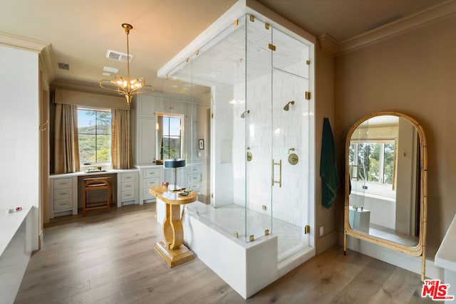 bathroom featuring wood-type flooring, crown molding, vanity, and independent shower and bath