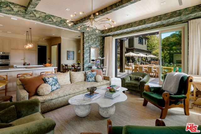 living room featuring a chandelier