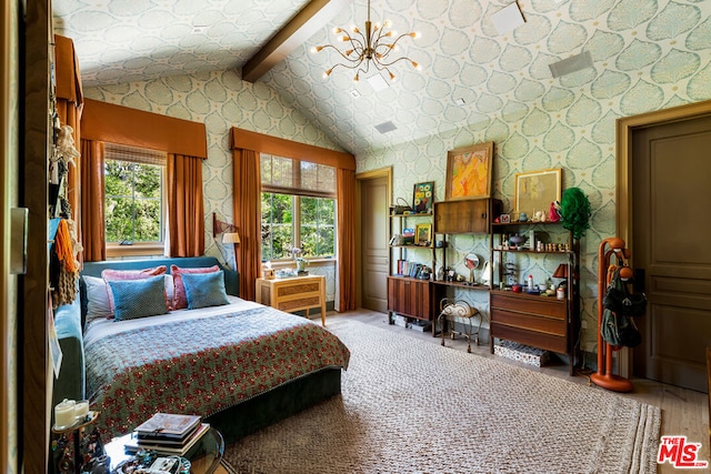 bedroom with wood-type flooring, lofted ceiling with beams, and a chandelier