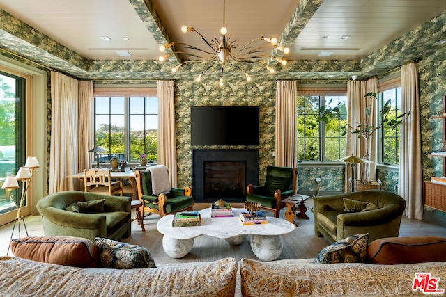 interior space featuring a chandelier and a high end fireplace