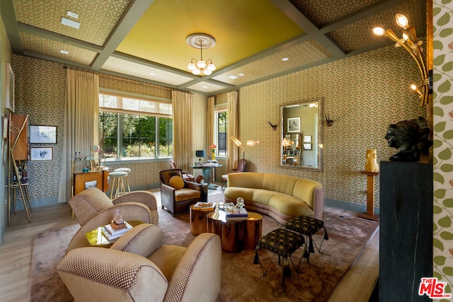 sitting room featuring beam ceiling, coffered ceiling, and hardwood / wood-style floors