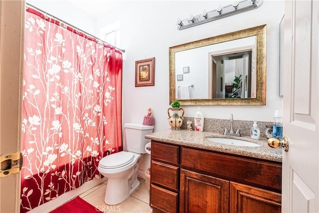 full bathroom with tile patterned floors, vanity, toilet, and shower / bath combo