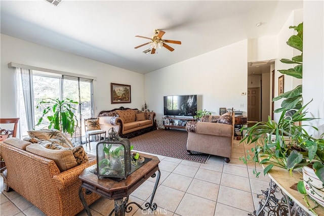 living room with light tile patterned floors and ceiling fan